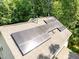 Close up aerial view of solar panels on the roof of a house at 3425 Donnigale Ave, Durham, NC 27705