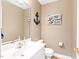 Coastal style half bathroom with white sink and nautical decorations at 3436 Candlebrook Ct, Mebane, NC 27302