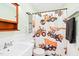 Bathroom with sink and construction-themed shower curtain at 3436 Candlebrook Ct, Mebane, NC 27302