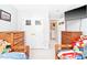 Bright bedroom with two beds, wooden dressers, closet, and a TV, perfect for or guests at 3436 Candlebrook Ct, Mebane, NC 27302