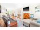 Inviting living room with a fireplace, plush seating, and wood floors at 3436 Candlebrook Ct, Mebane, NC 27302