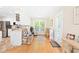 Bright and airy living room offering ample natural light and hardwood floors at 3436 Candlebrook Ct, Mebane, NC 27302