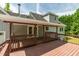 View of the home's outdoor porch and the chimney on the roof at 35 Fire Tower Dr, Rougemont, NC 27572