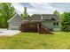 This home has a gorgeous backyard deck and ample outdoor space to enjoy at 35 Fire Tower Dr, Rougemont, NC 27572