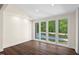 Bright sun room with large windows, offering natural light and a view of the outdoors at 35 Fire Tower Dr, Rougemont, NC 27572