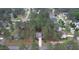 An aerial view of a home in a lush community featuring mature trees at 35 Pine Water Way, Spring Lake, NC 28390