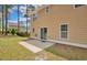 Charming home featuring sliding glass doors to a patio, and fenced backyard at 35 Pine Water Way, Spring Lake, NC 28390