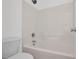 A neutral bathroom with a shower and tub at 35 Pine Water Way, Spring Lake, NC 28390