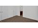 Bedroom with neutral color palette, plush carpet, and ensuite bath at 35 Pine Water Way, Spring Lake, NC 28390