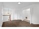 This bedroom has plush carpeting, fresh paint, a closet, and a transitional-style light fixture at 35 Pine Water Way, Spring Lake, NC 28390
