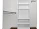 A walk-in closet with white shelving and a clothing bar at 35 Pine Water Way, Spring Lake, NC 28390