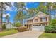 Beautifully landscaped two-story home with a manicured front yard, perfect for suburban living at 35 Pine Water Way, Spring Lake, NC 28390