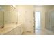 Bathroom features a double sink vanity and walk-in shower at 4024 Claret Ln, Morrisville, NC 27560