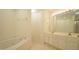 Bathroom featuring a jetted tub and double sink vanity at 4024 Claret Ln, Morrisville, NC 27560