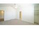 Neutral bedroom with large closet, ceiling fan, and ensuite bathroom at 4024 Claret Ln, Morrisville, NC 27560