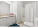 Cozy bathroom with a single vanity, a toilet, and a shower with a curtain at 416 Mitchell St, Hillsborough, NC 27278