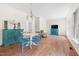 Dining area features an oriental cabinet, a dining table and four chairs at 416 Mitchell St, Hillsborough, NC 27278
