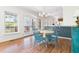 Bright dining area featuring a dining table with seating and access to the deck at 416 Mitchell St, Hillsborough, NC 27278