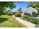 A lovely home with well-manicured landscaping and a welcoming walkway at 416 Mitchell St, Hillsborough, NC 27278