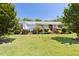 Inviting single-story home showcasing a well-manicured lawn and a charming front porch at 416 Mitchell St, Hillsborough, NC 27278
