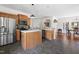 Spacious kitchen featuring stainless steel appliances, wooden cabinets, and an island at 416 Mitchell St, Hillsborough, NC 27278