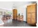 Kitchen pantry and dining room with hardwood floors, and plenty of cabinet storage at 416 Mitchell St, Hillsborough, NC 27278
