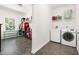 Utility room featuring lots of storage and a newer model washer at 416 Mitchell St, Hillsborough, NC 27278