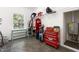 Utility room with storage shelves, a desk and lots of space at 416 Mitchell St, Hillsborough, NC 27278