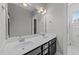 Well-lit bathroom with double vanity and modern fixtures at 508 Vervain Way, Holly Springs, NC 27540