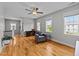 Inviting bonus room with hardwood floors, natural light, and ceiling fan at 508 Vervain Way, Holly Springs, NC 27540