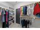 Spacious walk-in closet with shelving and rods for ample storage at 508 Vervain Way, Holly Springs, NC 27540