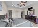 Spacious bedroom with modern decor, large dresser, and easy access to kitchen at 51 Balboa Parkway Pkwy, Clayton, NC 27520