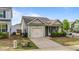 Charming single-story home with a well-manicured lawn and inviting covered front porch at 51 Balboa Parkway Pkwy, Clayton, NC 27520