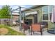 Charming patio with stylish seating, an outdoor grill, and string lights, ideal for relaxation and gatherings at 51 Balboa Parkway Pkwy, Clayton, NC 27520