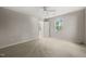 Bedroom featuring carpeted floors, large windows and ceiling fan at 5212 Badham Pl, Raleigh, NC 27609