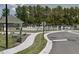 Community pool surrounded by lounge chairs and lush landscaping, offering residents a refreshing outdoor space at 525 Durants Neck Ln, Morrisville, NC 27560