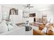 Bright living room with modern decor, leading into the dining area and kitchen at 525 Durants Neck Ln, Morrisville, NC 27560