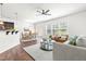 Bright and airy living room with a view of the dining area and sliding glass doors to the patio at 525 Durants Neck Ln, Morrisville, NC 27560