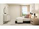 Bright bedroom showcasing a sleek dresser, oval mirror, and a comfortable bed with soft lighting at 548 Morning Light Dr, Angier, NC 27501