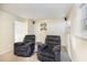 Cozy finished basement featuring plush seating and ample storage space at 5504 Crabtree Park Ct, Raleigh, NC 27612