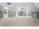 Expansive bonus room with multiple windows, carpet flooring, and recessed lighting at 5524 Jomali Dr, Durham, NC 27705