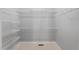 Walk-in closet with ventilated shelving and neutral carpet provides ample storage at 5524 Jomali Dr, Durham, NC 27705
