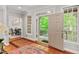Bright entryway showcases hardwood floors, natural light, and a glimpse into the dining area at 5524 Jomali Dr, Durham, NC 27705