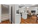 Stylish kitchen with white cabinets, stainless steel appliances, and hardwood floors at 5524 Jomali Dr, Durham, NC 27705