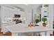 Modern kitchen boasting white countertops, stainless steel appliances, and plenty of natural light at 5524 Jomali Dr, Durham, NC 27705