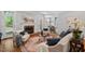 Inviting living room with hardwood floors, fireplace, and comfortable seating arrangement at 5524 Jomali Dr, Durham, NC 27705