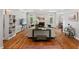 Bright living room featuring hardwood floors, fireplace, and comfortable seating at 5524 Jomali Dr, Durham, NC 27705