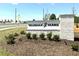 The Vaughan Farms community sign featuring lush landscaping at 58 Twin Birch Dr, Angier, NC 27501