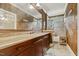Bathroom featuring double vanity, granite countertops and decorative tile in shower and flooring at 5901 Charleycote Dr, Raleigh, NC 27614