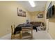 Bonus room with comfortable seating, table and tv, perfect for relaxing at 5901 Charleycote Dr, Raleigh, NC 27614